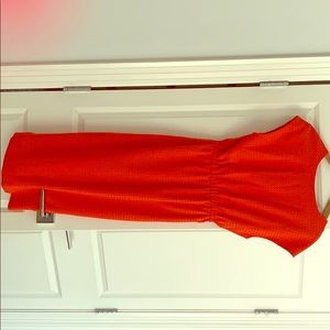 Scarlet red dress with diamond shape holes